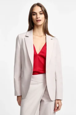 Blazer con bottone e tasche a pattina