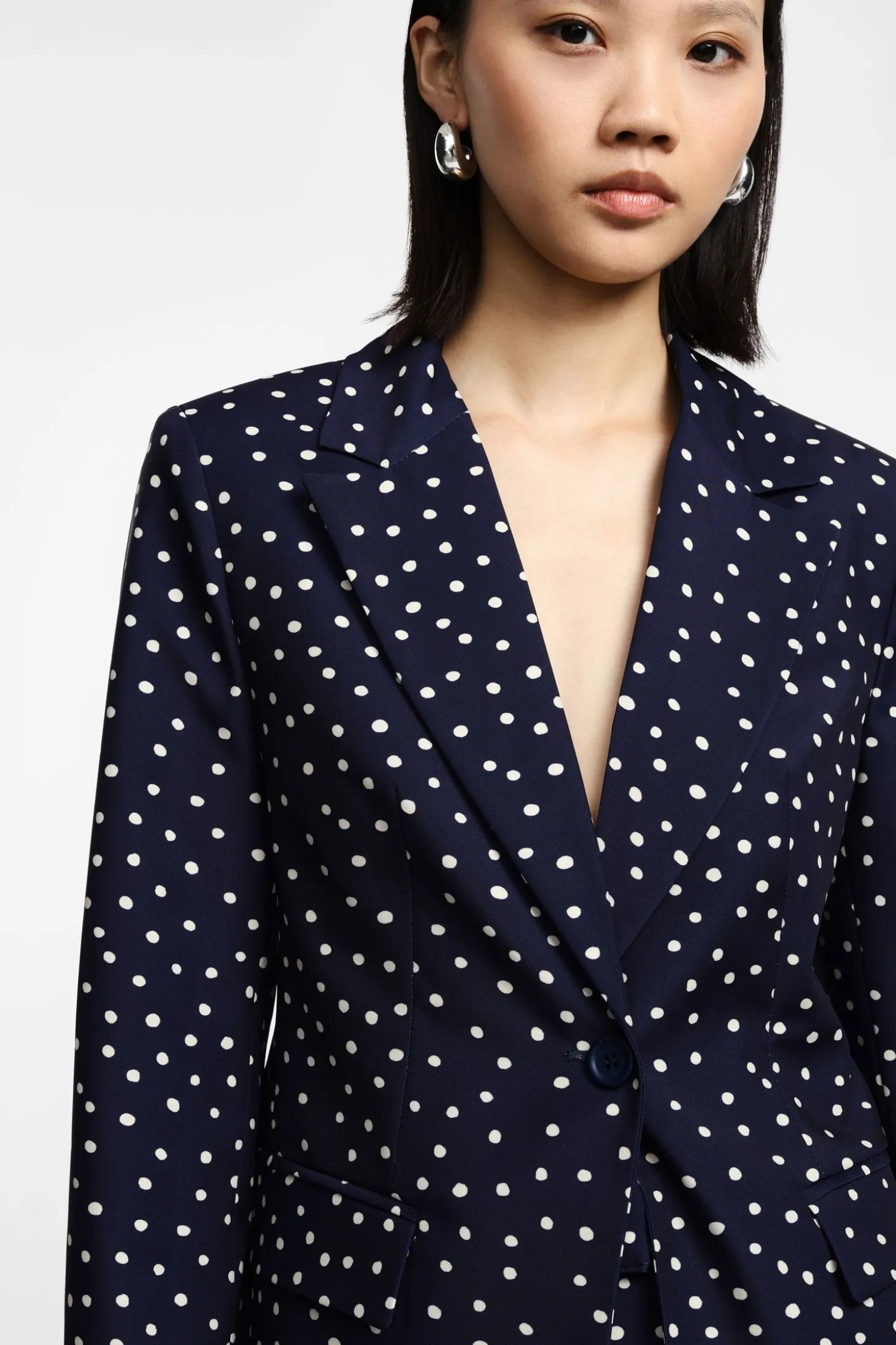 Blazer con bottoni singoli stampa pois