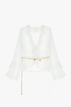 Blusa con maniche lunghe e volant