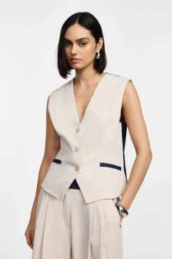 Gilet bicolor con bottoni e tasche