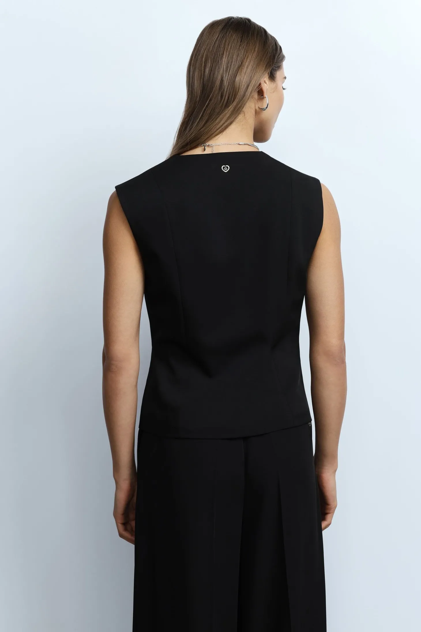 Gilet con bottoni frontali