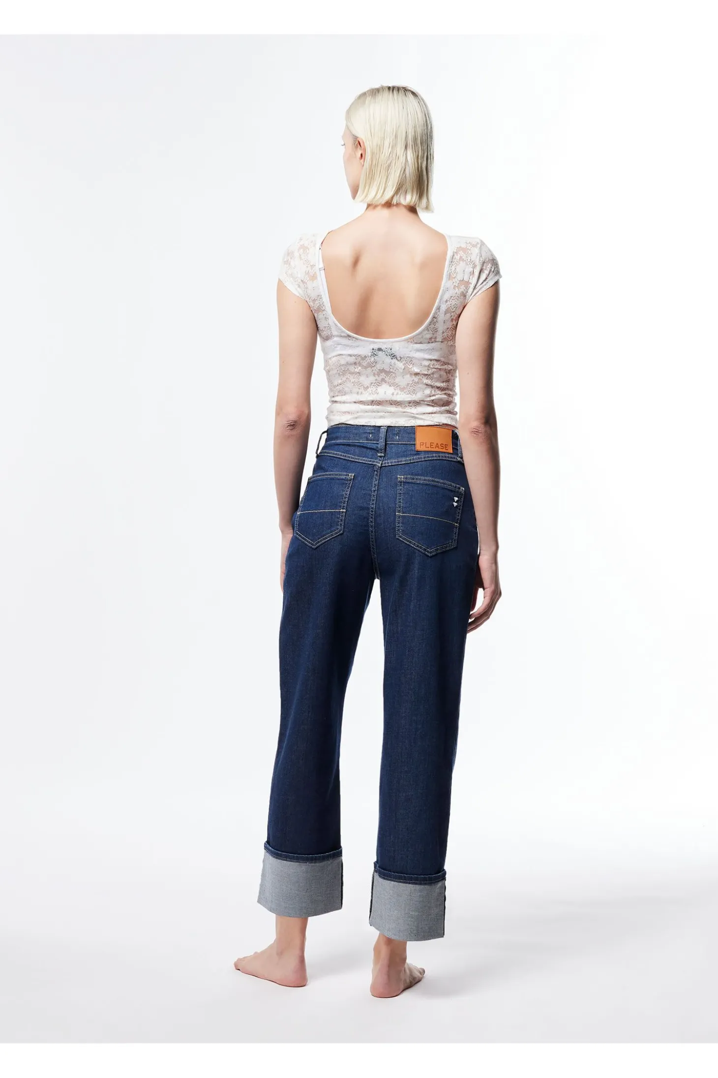 Jeans a gamba larga con risvolti