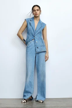 Jeans a gamba larga con spacchi