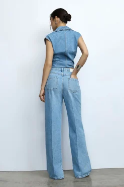Jeans a gamba larga con spacchi