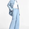 Jeans a gamba larga con vita media