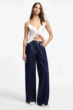 Jeans a gamba larga con vita alta e piega