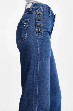 Jeans a zampa con bottoni laterali
