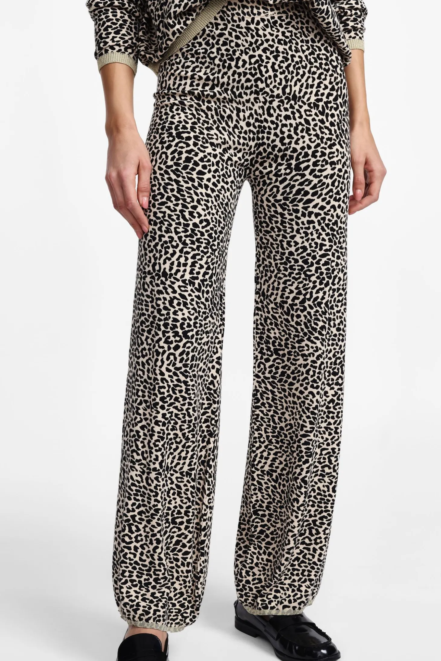 Pantaloni a zampa stampa animalier