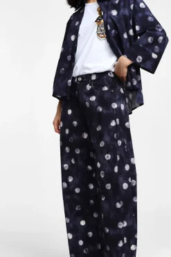 Pantaloni ampi con stampa pois