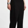 Pantaloni ampi vita alta con chiusura asimmetrica