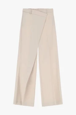 Pantaloni ampi vita alta con chiusura asimmetrica