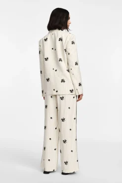 Pantaloni ampia gamba a righe e stampa floreale