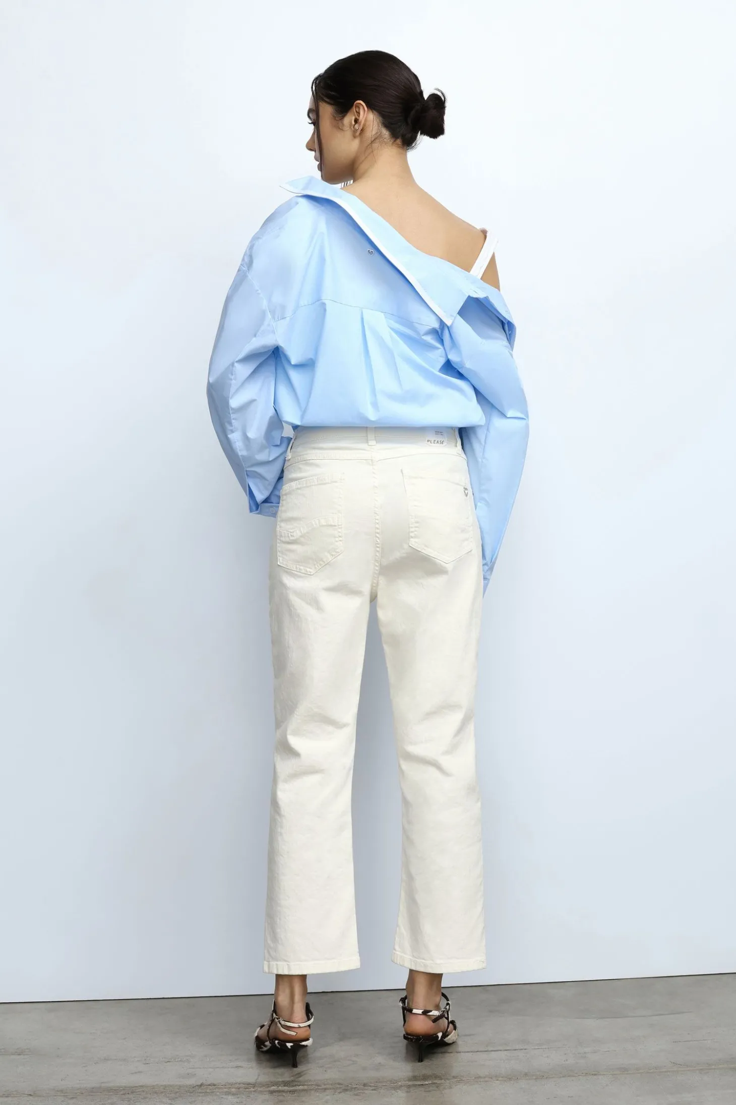 Pantaloni baggy con tasche e bottoni a vista