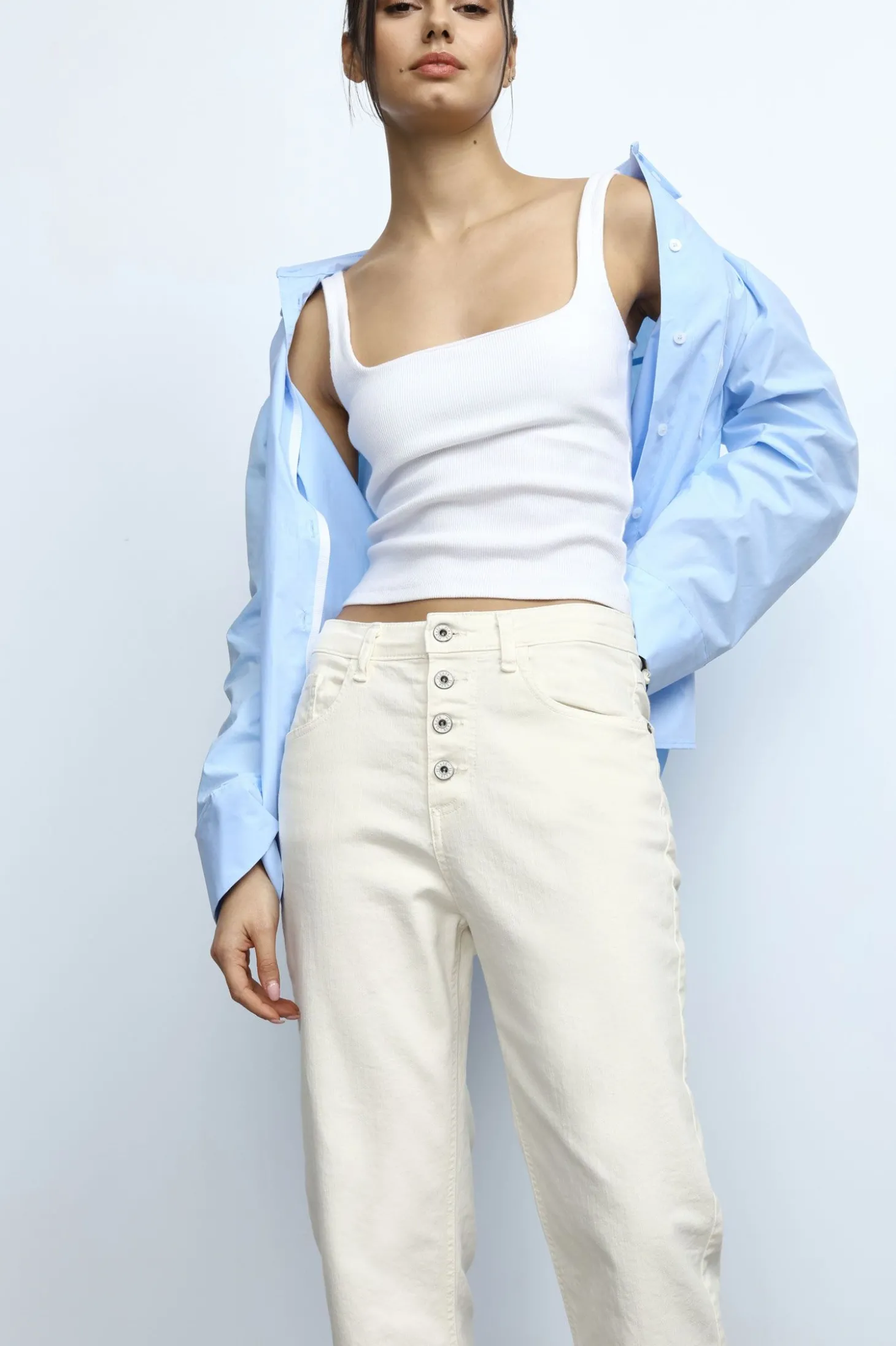 Pantaloni baggy con tasche e bottoni a vista