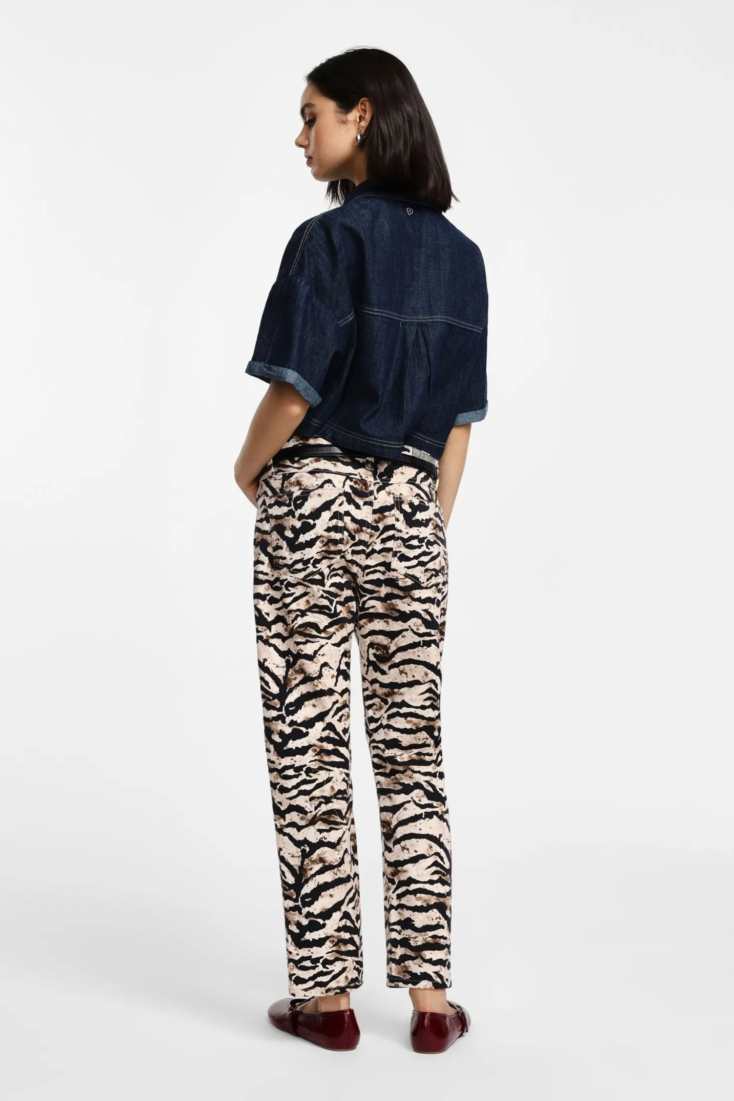 Pantaloni chinos con stampa animalier zebra