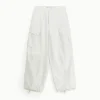 Pantaloni con tasche grandi e orli regolabili