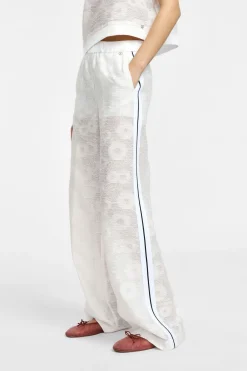 Pantaloni palazzo in pizzo con culotte